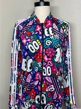 Adidas x Hattie Stewart collaborative "Eyes" print Superstar track top jacket.